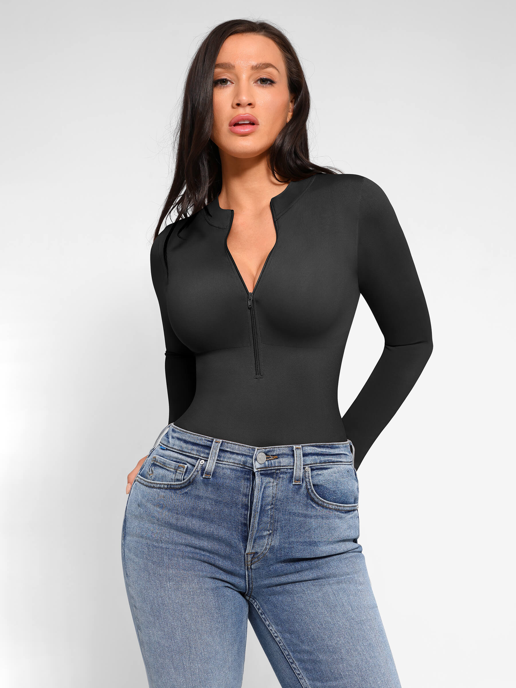 https://cdn.shopify.com/s/files/1/0089/1846/6641/files/FeelinGirl_Seamless_Long_Sleeve_Zipper_Thong_Bodysuit_19.jpg?v=1765451284