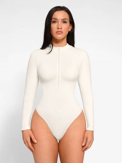 https://cdn.shopify.com/s/files/1/0089/1846/6641/files/FeelinGirl_Seamless_Long_Sleeve_Zipper_Thong_Bodysuit_2.jpg?v=1765451284