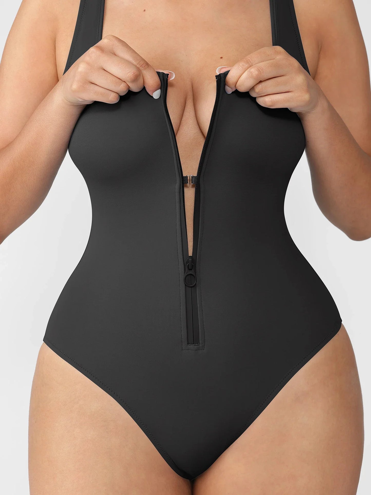 https://cdn.shopify.com/s/files/1/0089/1846/6641/files/Feelingirl-Waist-Tummy-Control-One-Piece-Swimsuit-in-Black-8.webp?v=1769673102