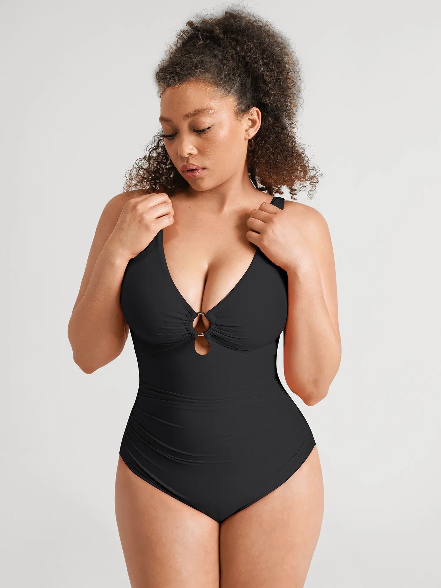 https://cdn.shopify.com/s/files/1/0089/1846/6641/files/FeelingirlBuilt-InPadsTummy-ControlRuchedSwimsuit-BK01-4.webp?v=1769132017