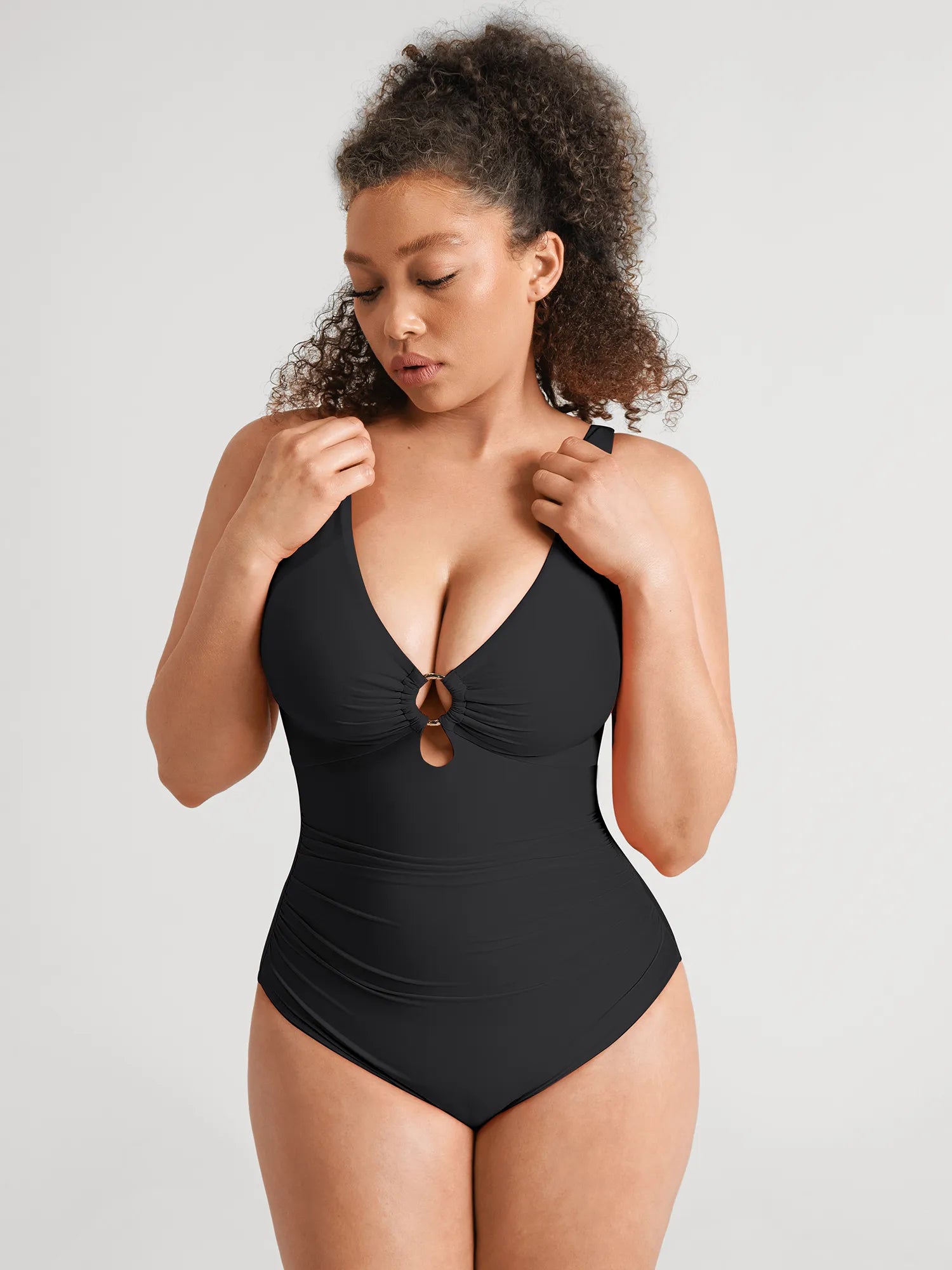 https://cdn.shopify.com/s/files/1/0089/1846/6641/files/FeelingirlBuilt-InPadsTummy-ControlRuchedSwimsuit-BK01-4.webp?v=1769132017