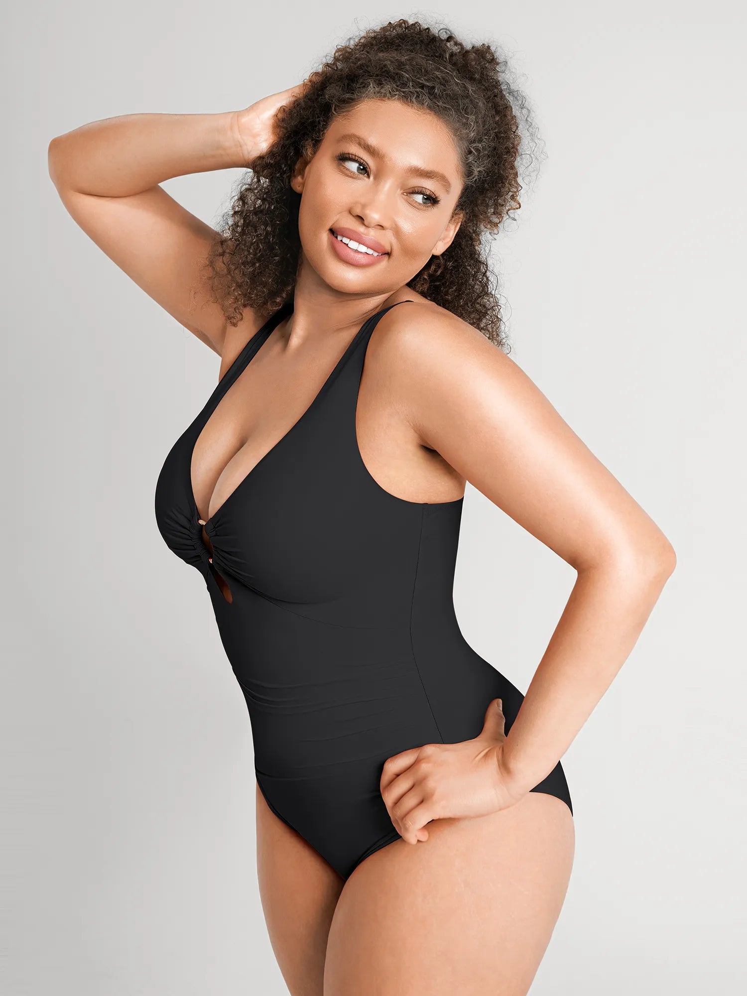 https://cdn.shopify.com/s/files/1/0089/1846/6641/files/FeelingirlBuilt-InPadsTummy-ControlRuchedSwimsuit-BK01-9.webp?v=1769132017