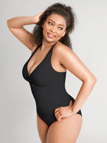 https://cdn.shopify.com/s/files/1/0089/1846/6641/files/FeelingirlBuilt-InPadsTummy-ControlRuchedSwimsuit-BK01-9.webp?v=1769132017