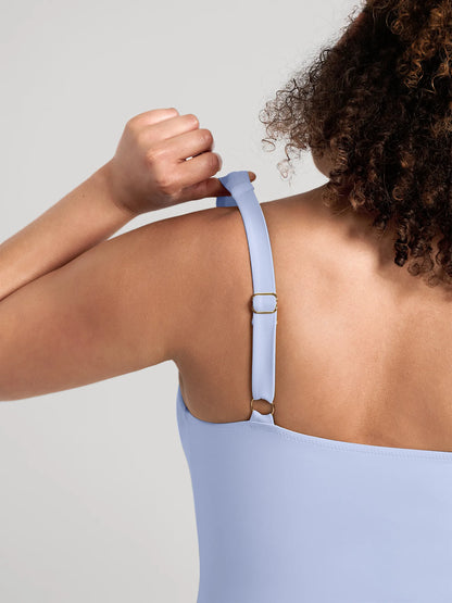 https://cdn.shopify.com/s/files/1/0089/1846/6641/files/FeelingirlBuilt-InPadsTummy-ControlRuchedSwimsuit-BU04-9.webp?v=1769132017